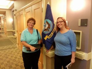 Kathy Cayton and Marty attended the Community Hospice Veterans Partnership meeting today and Kathy took her on a tour of the Sunbeam Road Inpatient facility. This is a picture with the service flags that we have helped purchase, which are displayed outside of each Veteran's room.