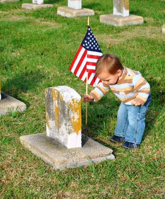 Members of NWCA Portsmouth #221 placed flags on the graves of our veterans.Even the children helped out.